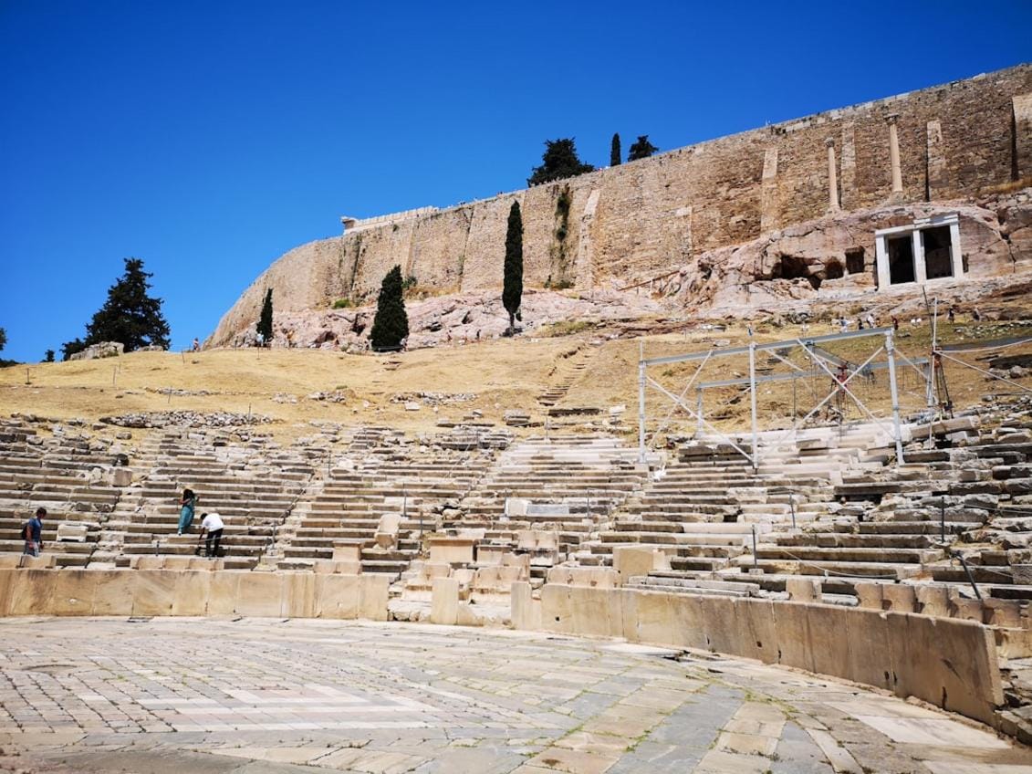 The ancient theater of Antiphellos overlooking the sea with lush surroundings of Kaş, illustrating historic grandeur