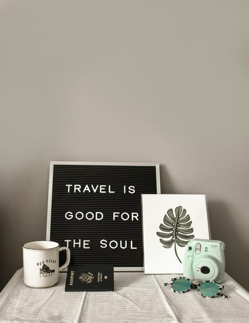 smart packing A suitcase with essentials spilling out, emphasizing the importance of packing strategically for travel mishaps.